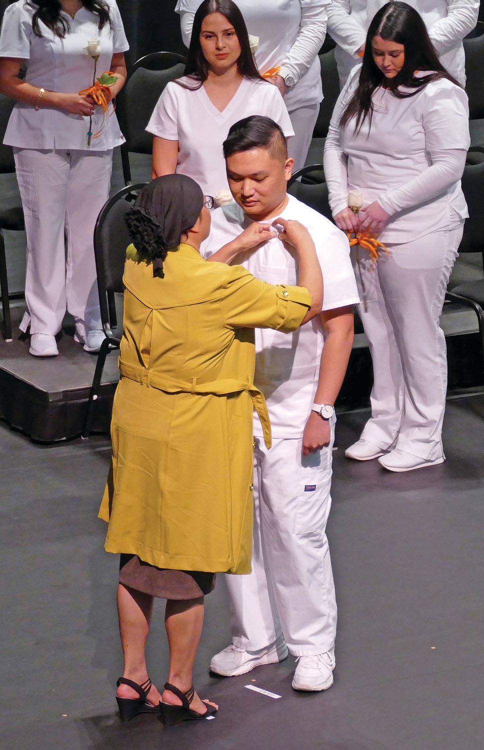 Karl Asumen of Highlands County was pinned by his mother, Amie.